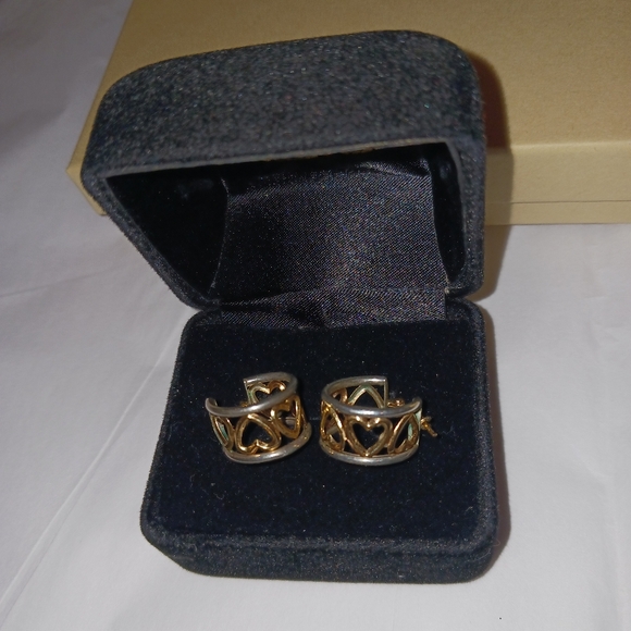 14k solid white & yellow hoops with hearts design.